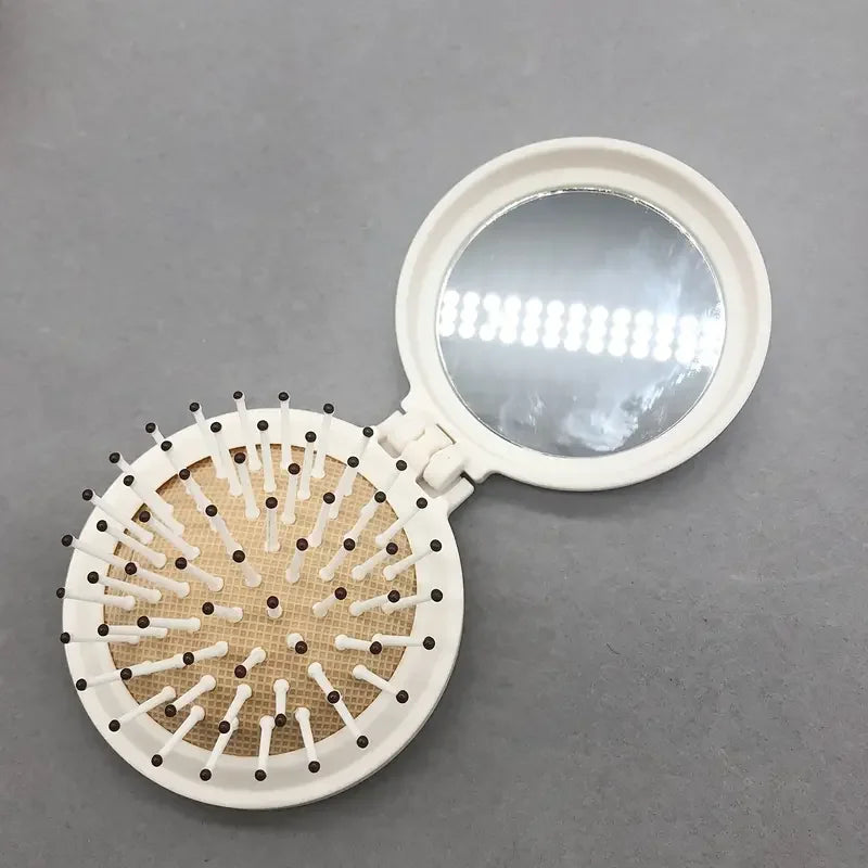Folding Mirror with Air Cushion Comb
