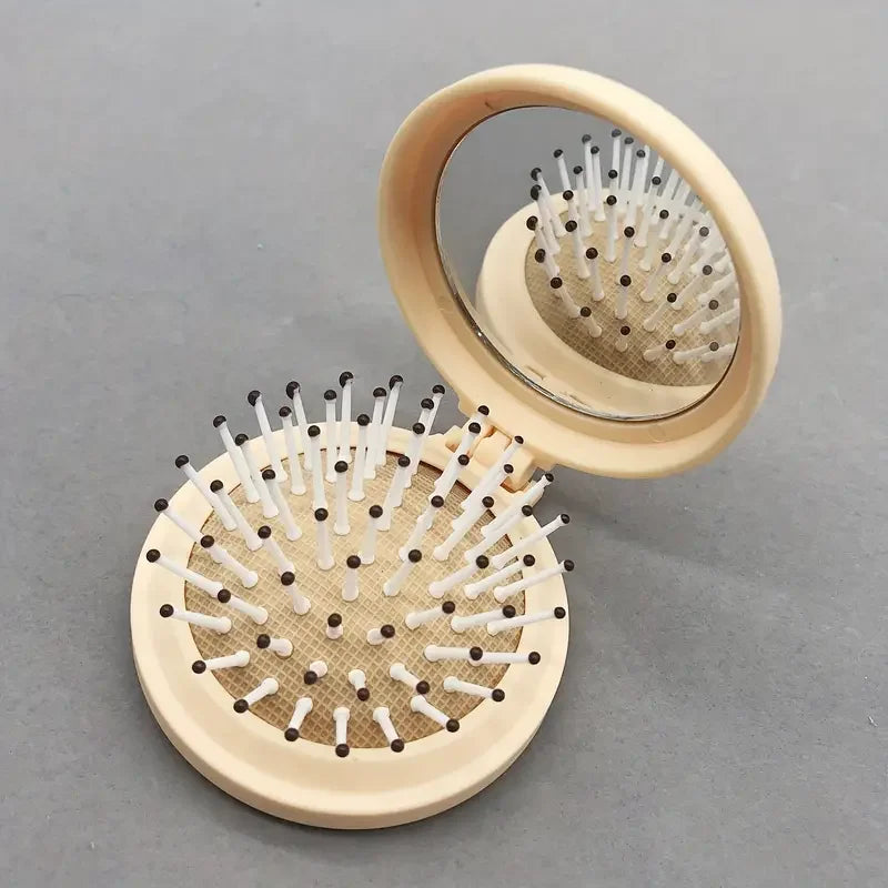 Folding Mirror with Air Cushion Comb